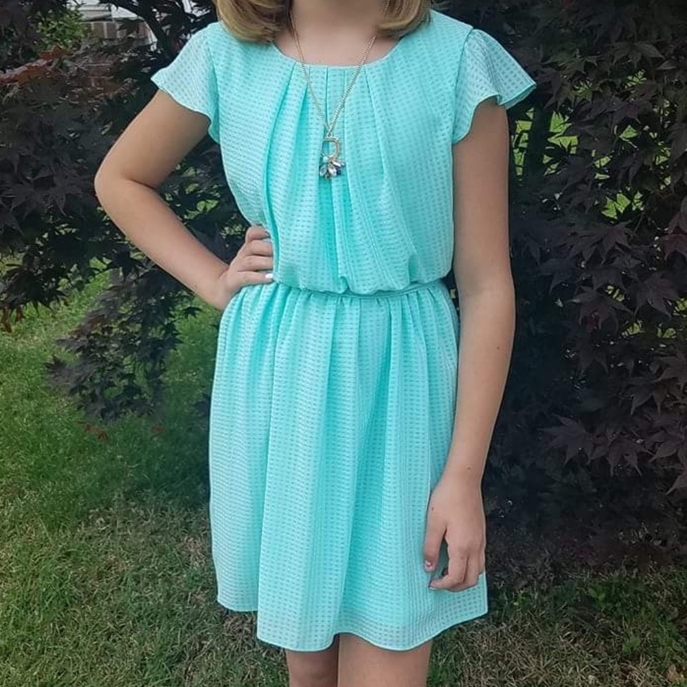 Adorable girl's dress with necklace